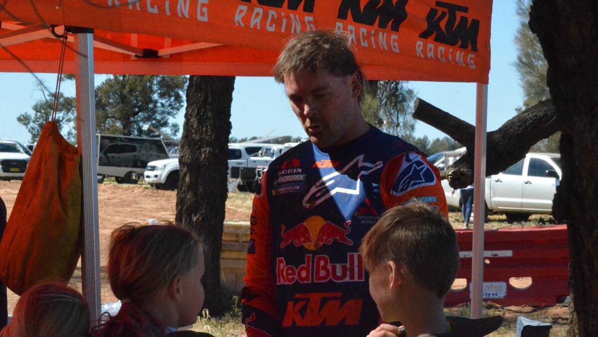 Toby Price talks to his fans during a visit to Coleambally during 2019