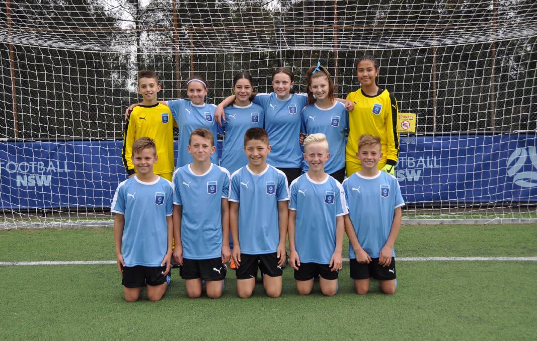 UP-AND-COMING: Eleven of Griffith's talented young footballers playing at the Football NSW State Titles. PHOTO: Contributed