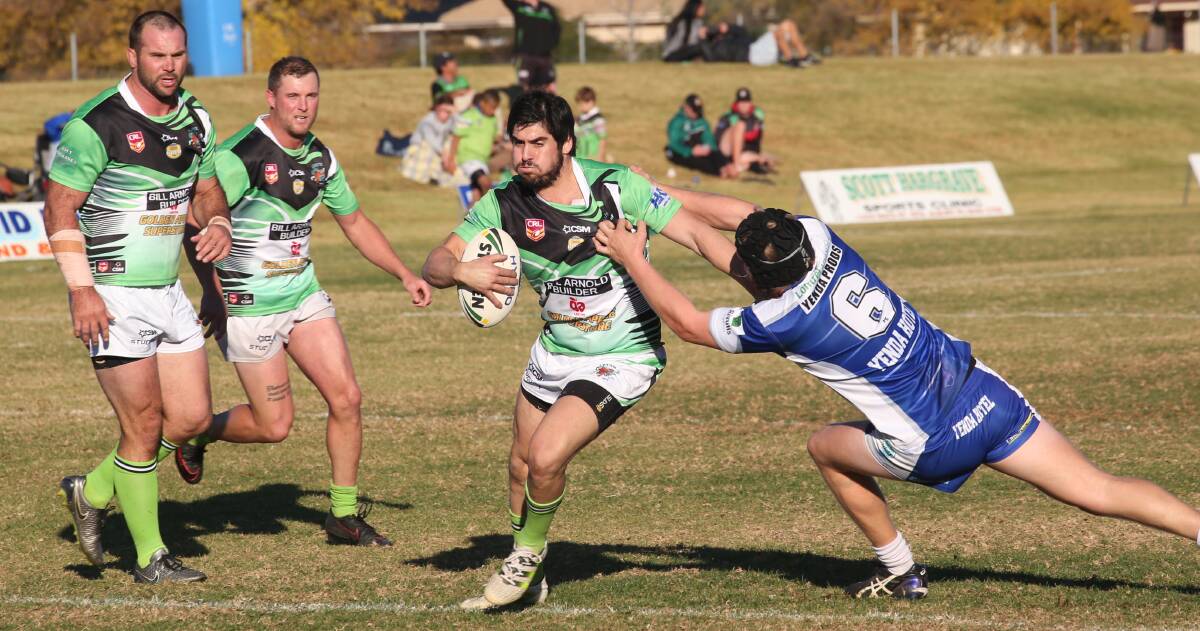 BREAKING THROUGH: The Greens' Brayden Scarr attempts to break the line as he continued his good form, picking up a try against Yenda. PHOTO: Anthony Stipo