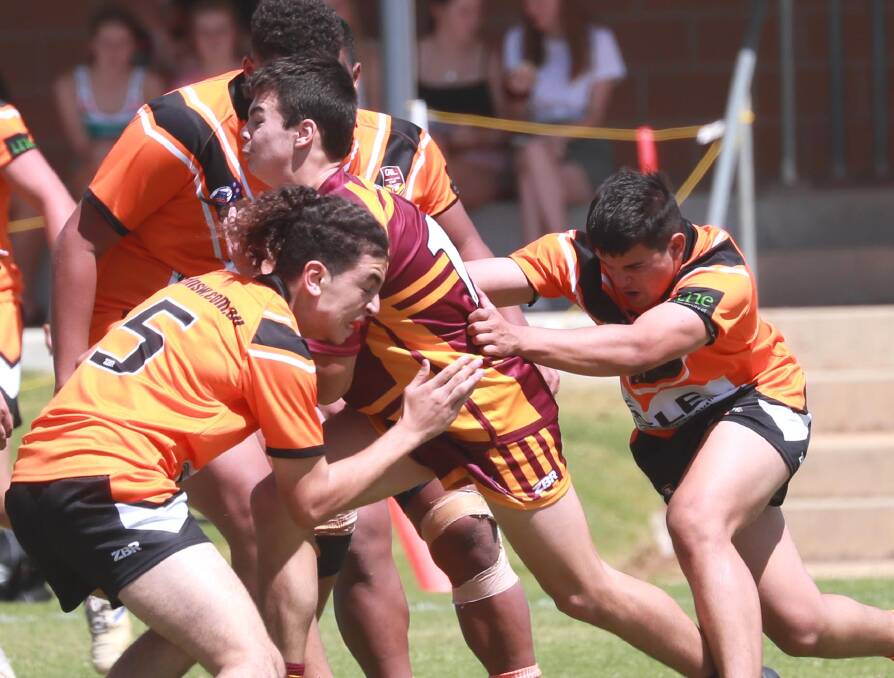 SHOW OF STRENGTH: Riverina Bulls' Jack Neyland looks to punch a hole during his side's Andrew Johns Cup against GSR Tigers. PHOTO: Les Smith