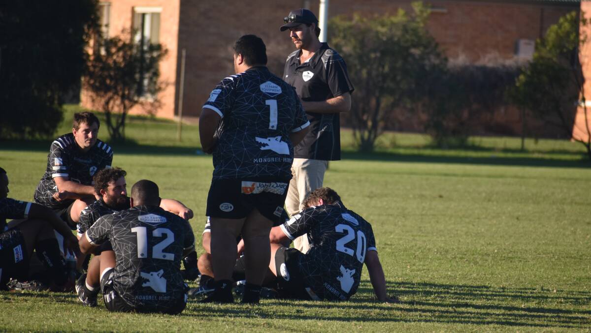 Blacks coach Mitch White addresses his troops after the Griffith side fell to a 67-24 defeat at the hands of Wagga City. Picture by Liam Warren