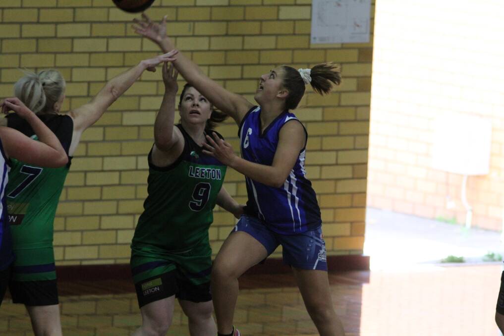 TOUGH BATTLE: Griffith's Abby Favell looks to gain possession during the Demons clash with Leeton last weekend. PHOTO: Talia Pattison