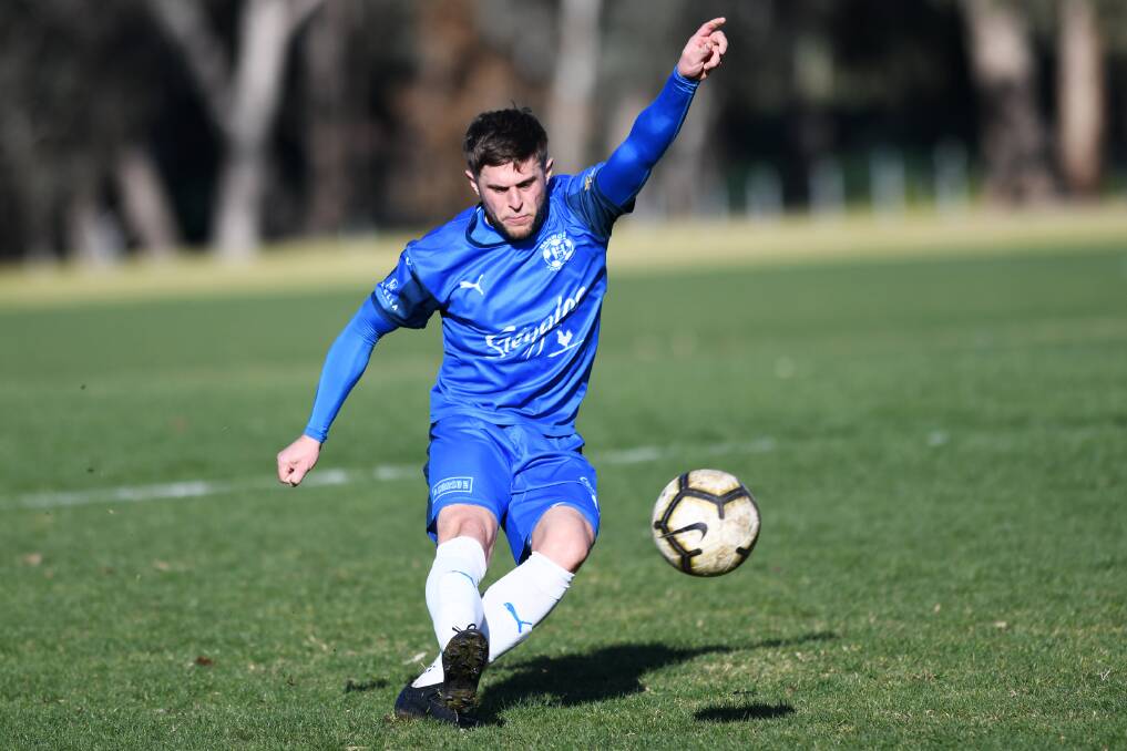 LONG BALL: Hanwood's Jordan Beltrame tries to get his side moving forward during their clash with Wagga United last weekend. PHOTO: Sean Matikainen