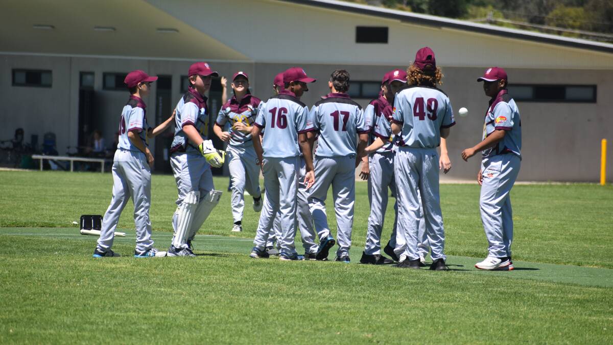 CELEBRATION: The under 14s side come together after a dismissal in their win over Northern Riverina. PHOTO: Liam Warren
