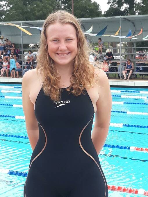 GREAT SWIM: Samantha Taylor was all smiles after jumping out of the pool at the Riverina Swimming Carnival having broken a long standing record. PHOTO: Supplied