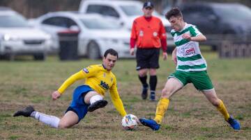 Isaac Donadel slides in looking to win back possession during Yoogali SC's defeat at the hands of Tuggeranong. PHOTO: Andrew McLean