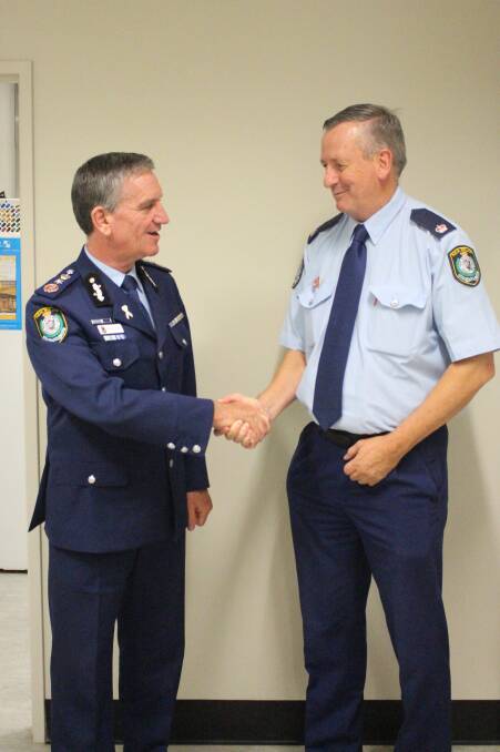 VISITOR: Police Commissioner, Andrew Scipione with Inspector Tony Reneker as part as his farewell the troops trip around NSW. PHOTO: Liam Warren