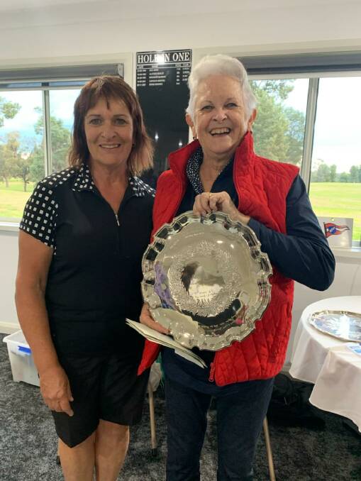 VICTOR: Ann Webber, a Vice President of the RWGA and Chris Cunial with her Division 3 Trophy. PHOTO: Contributed