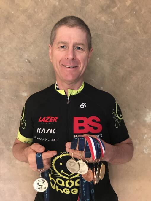 MEDALS GALORE: Peter Budd shows off the silverware he picked up on the Metropolitan Road Championships making it seven in a row. PHOTO: Supplied