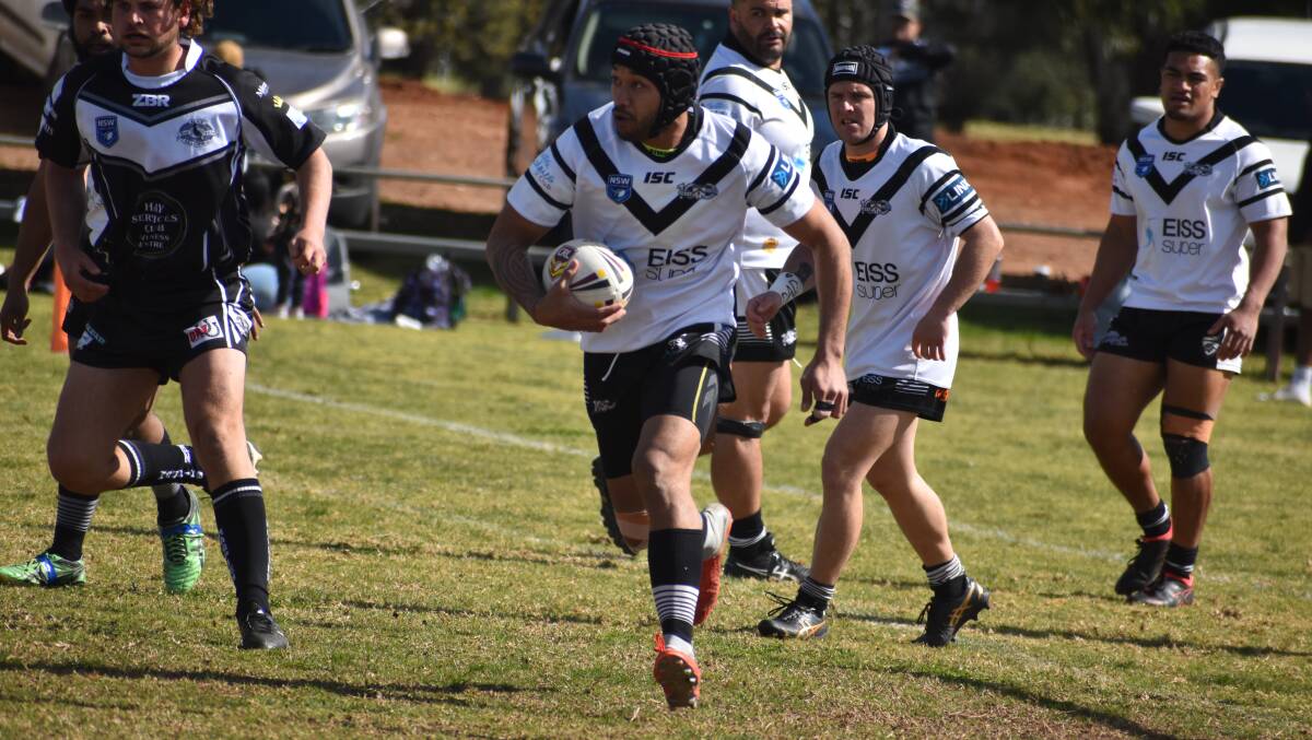 ALIVE: Black and Whites' Sione Tulahe runs at the line against Hay.