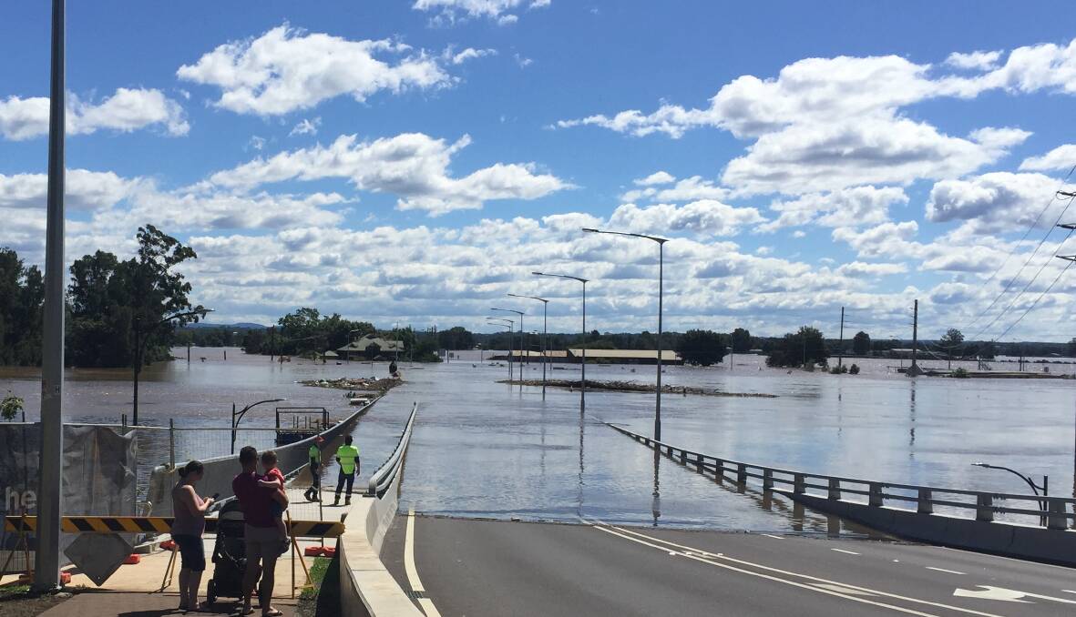 The new "flood-free" Windsor bridge under flood water on Wednesday. Picture by Sarah Falson. 