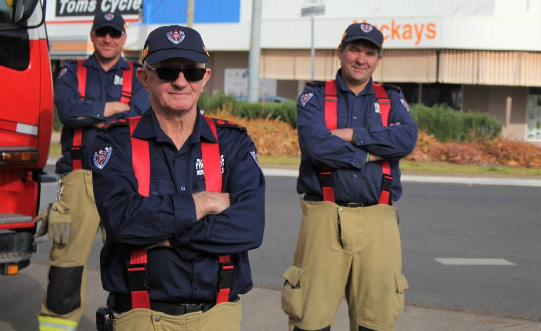 Vice circle: Griffith's Fire and Rescue NSW station commander Kevin Roth, with Steven Apolloni and Vito Montagner, says the roundabout is 'dangerous'. Picture: Steff Wills 