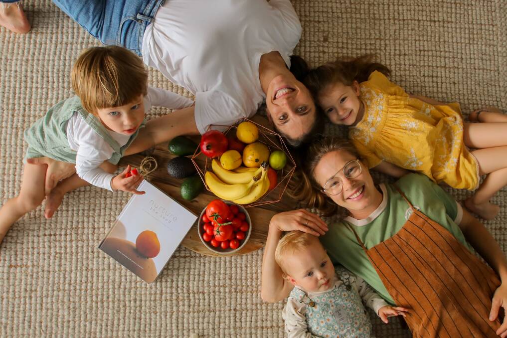 MYTH BUSTING: Renee Jennings and Georgia Gregory with their children and their new pregnancy cookbook and nutrition book, Nurture The Seed, written from 'evidence based science'. Clockwise from left, Freddie, Renee and Norah Jennings, Georgia Gregory and Floriane Cooper. Picture: Wesley Lonergan