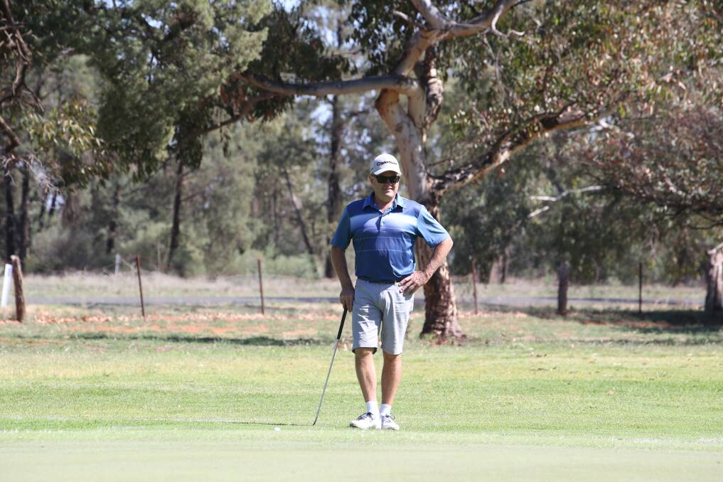 TAKING NOTE: Greg Ingles weighs up his options at the Griffith Golf Club. Picture: Anthony Stipo