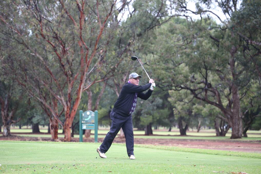 LONG WEEKEND: Don Hilliam makes use of the Queen's Birthday weekend with a round of golf. Picture: Anthony Stipo