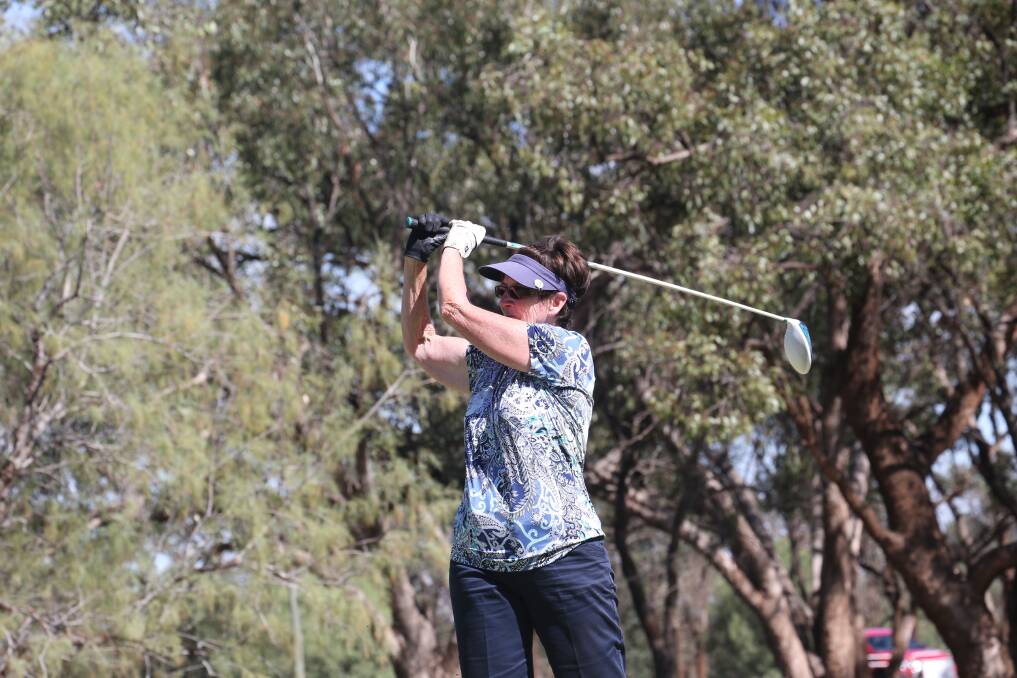 SUMMER SPORT: Robyn Barrington takes advantage of the good weather at the Griffith Golf Club at the weekend. Picture: Anthony Stipo