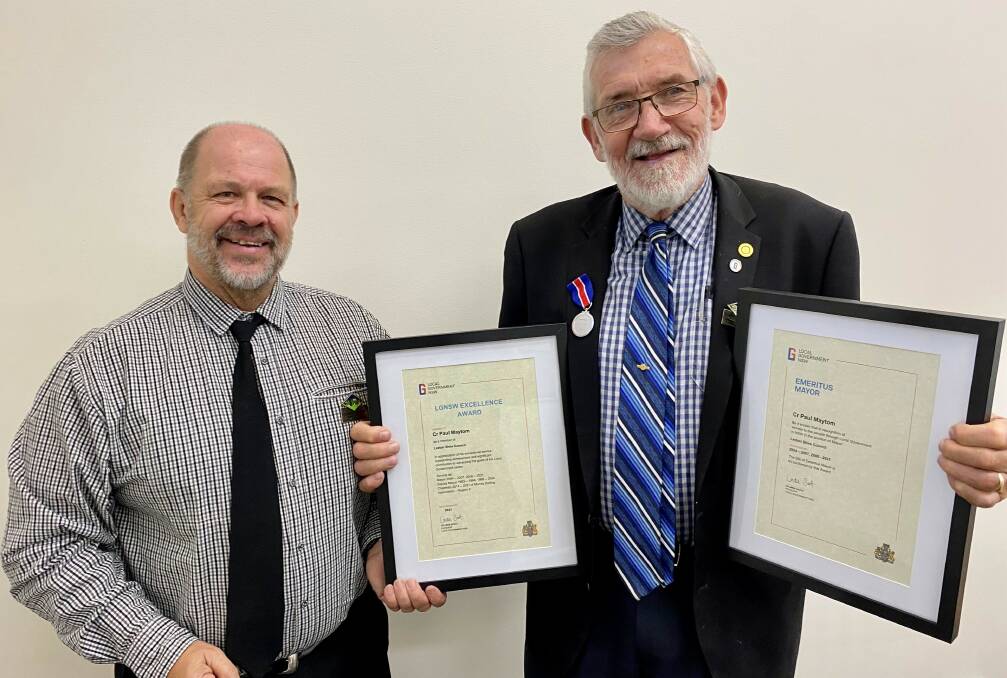 Retiring Leeton mayor Paul Maytom (right) pictured with councillor George Weston after receiving two Local Government of NSW awards this year, says some people take swipes at councillors on social media, but it's not going anywhere. 