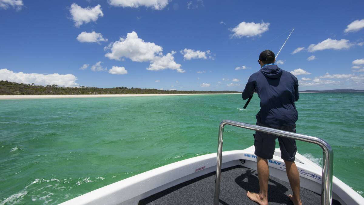 Casting a line with Hervey Bay Fly and Sport Fishing off Fraser Island in Queensland. Picture: Tourism Australia
