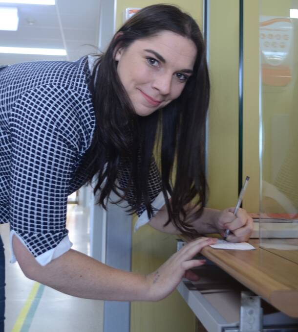 PICTURED: Jasmine John fills out her application to become a volunteer for the Auxiliary. PHOTO: Sarah Bentvelzen.