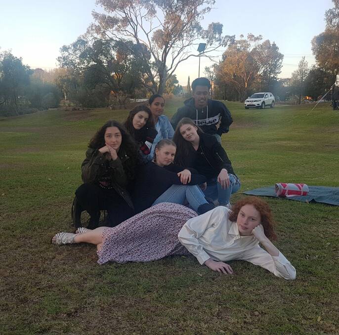 PICTURED: Maria Mortlock, Kate Simpson, Matilda Conlan, Kate Vaccari, Elizabeth Portolesi, Japleen Kaur, and Aduny Takele pose as The Breakfast Club. PHOTO: Courtesy Griffith Youth Committee.