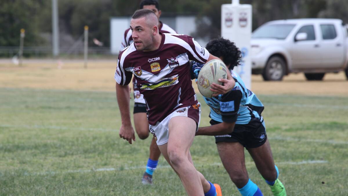 FOCUS: Yanco-Wamoon's Jesse Fitzhenry leaves his opponent behind during a match last season. 