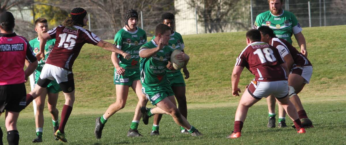 HOPEFUL: Leeton's Hayden Philp moves the ball forward for the Greens during a derby match up with Yanco-Wamoon last year. Photo: Talia Pattison 