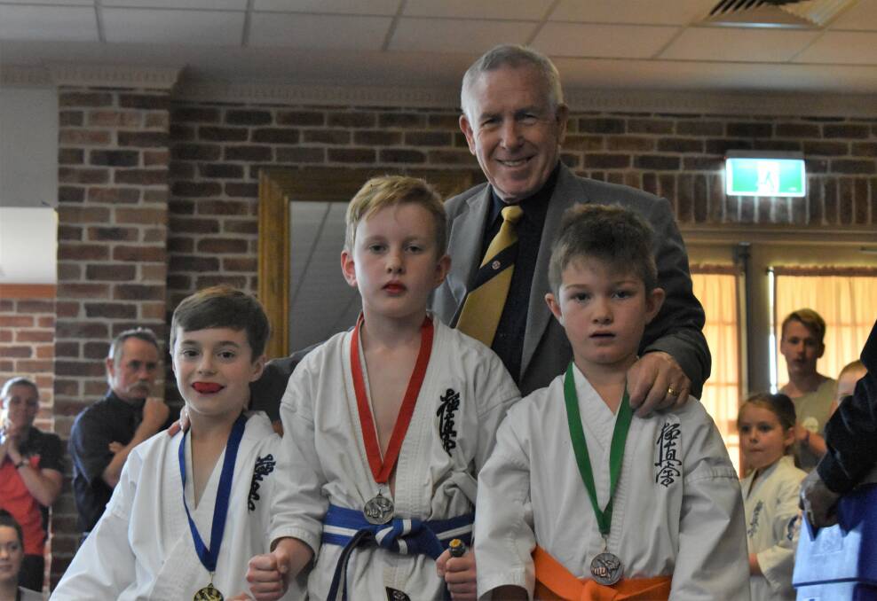 TOUGH CONTEST: Tyler Zandona, Nate Shields and Jack Rankin show off their medals from the Riverina Kyokushin Karate Championships. PHOTO: Shaun Paterson