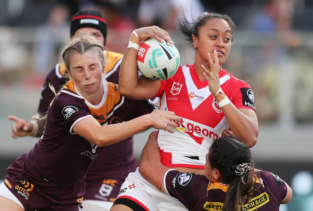BEST OF THE BEST: Lele Katoa is known for her explosive speed and ball skills, as she continues to make metres despite the best efforts of Broncos' players. PHOTO: Getty Images