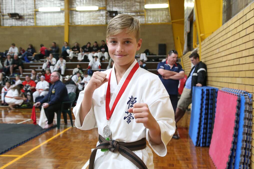 KARATE KID: Ryan Ford won the silver medal at the Riverina Kyokushin Championships in 2018. PHOTO: Anthony Stipo