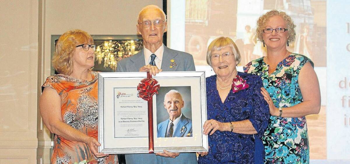 PROUD MOMENT: Roy Stacy is named Freeman of the City on this day in 2015, as his daughter Ros Prangell, wife Nancy and daughter Annette in't Hout look on.