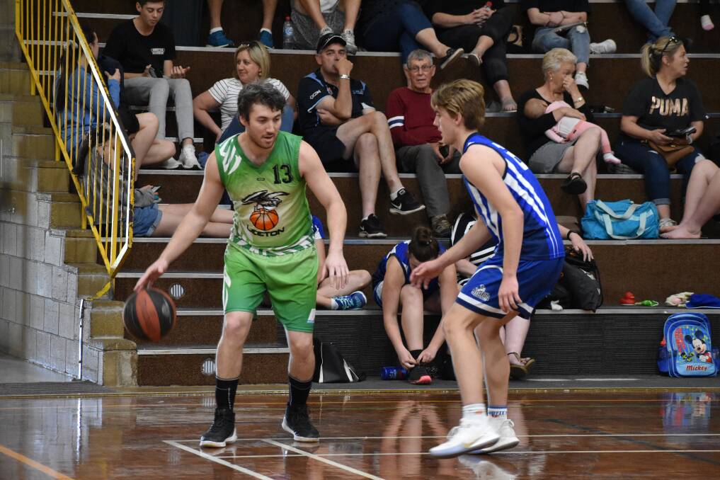 COURT CONTEST: Leeton Eagles' Luke Howe and Griffith Demons' Isaac Testoni were the two top scorers in the match at West End Sports Stadium on Saturday night. PHOTO: Shaun Paterson