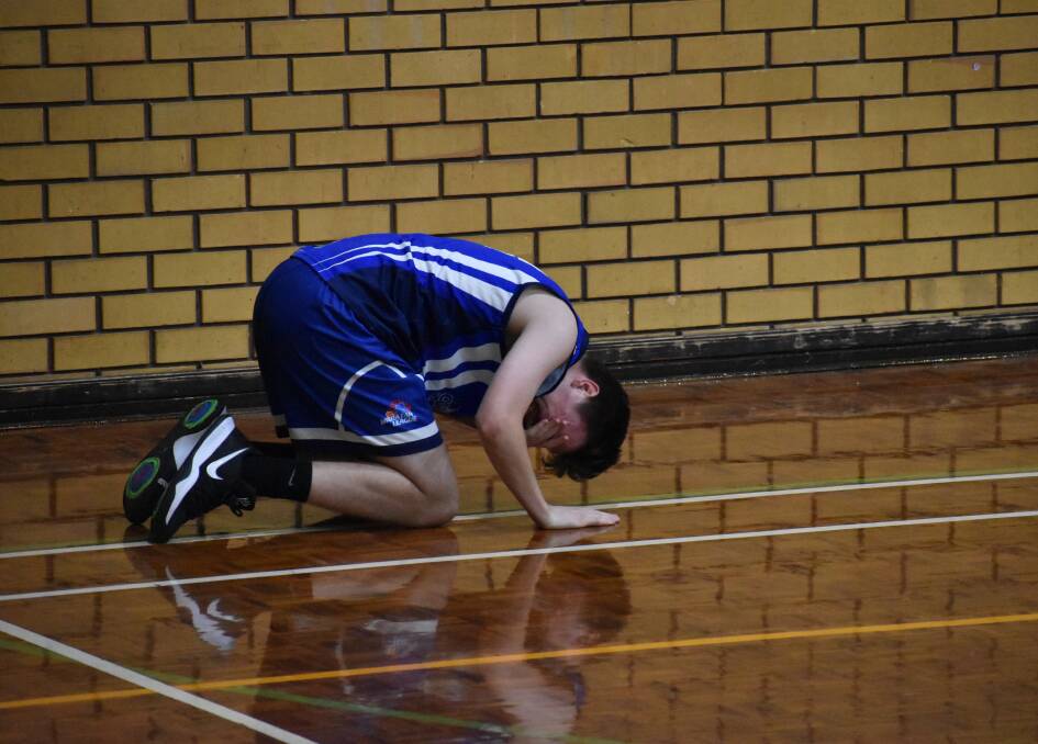 PHYSICALITY: Demons' Liam Blanch after being fouled during play. PHOTO: Shaun Paterson