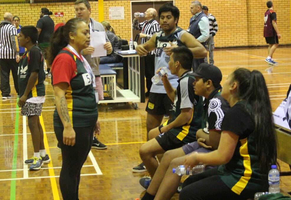 Green Frogs coach Jackie Tupa addresses her side. Picture: Andrew Piva