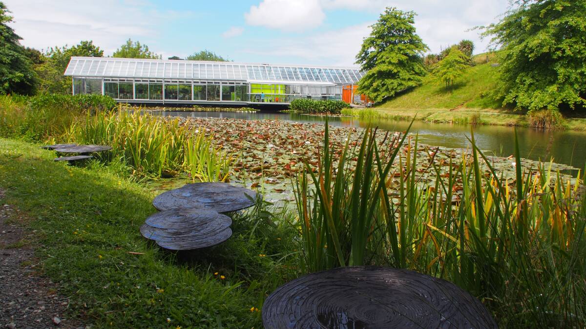 PRETTY AS A PICTURE: The beautiful glass pavilion is cantilevered over the lake at Brick Bay.​