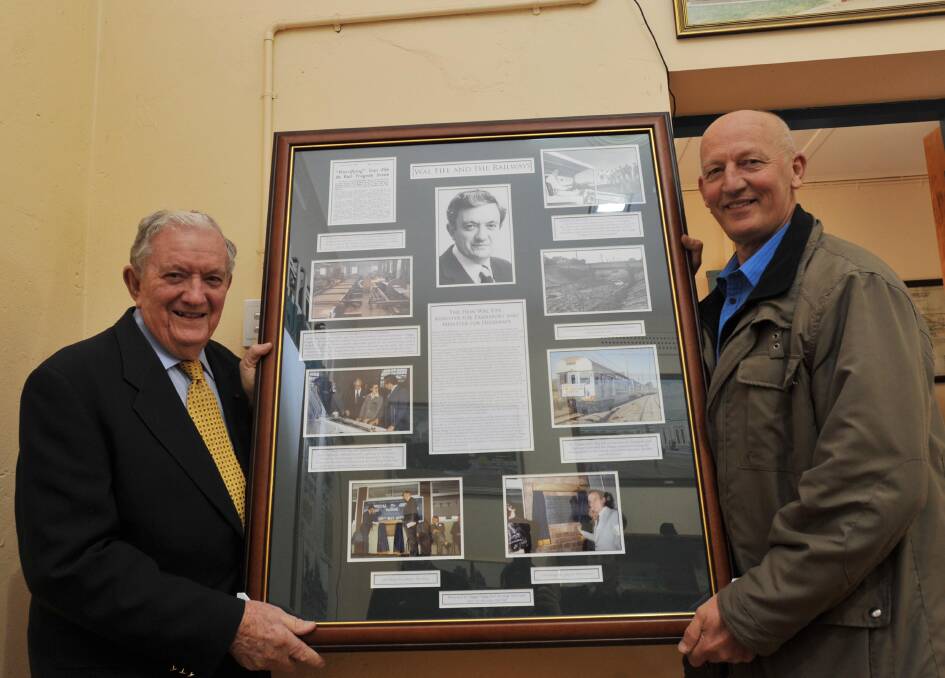 Former parliamentarian Wal Fife is pictured with Phil Horwell of the Wagga Rail Heritage Museum. Mr Fife (left) donated historic photographs and stories of his own and his families' involvement in Wagga rail to the museum in 2011.