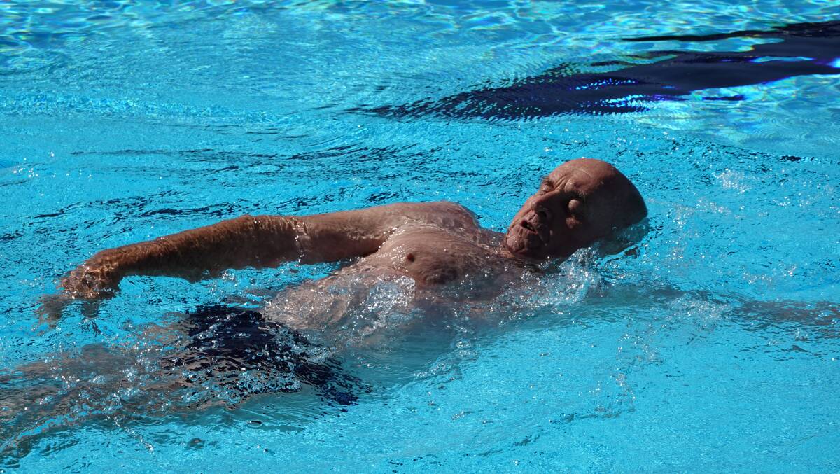 Mr Farrell swimming backstroke - his preferred stroke - in the new pool. Photo: Monty Jacka