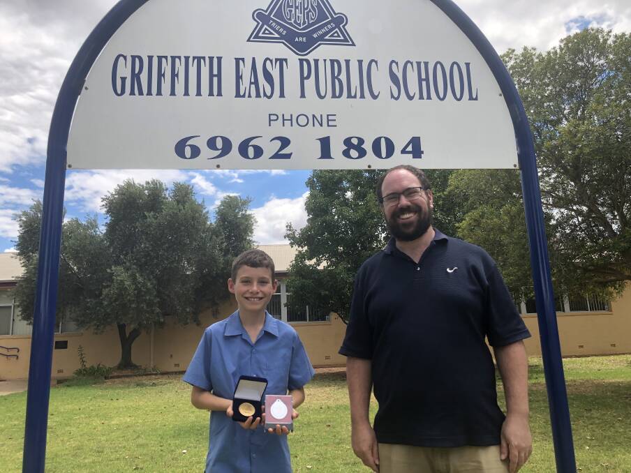 Flynn Bunn and his teacher Rhys Thomas, who is also Griffith East Public School's public speaking coordinator. PHOTO: Monty Jacka