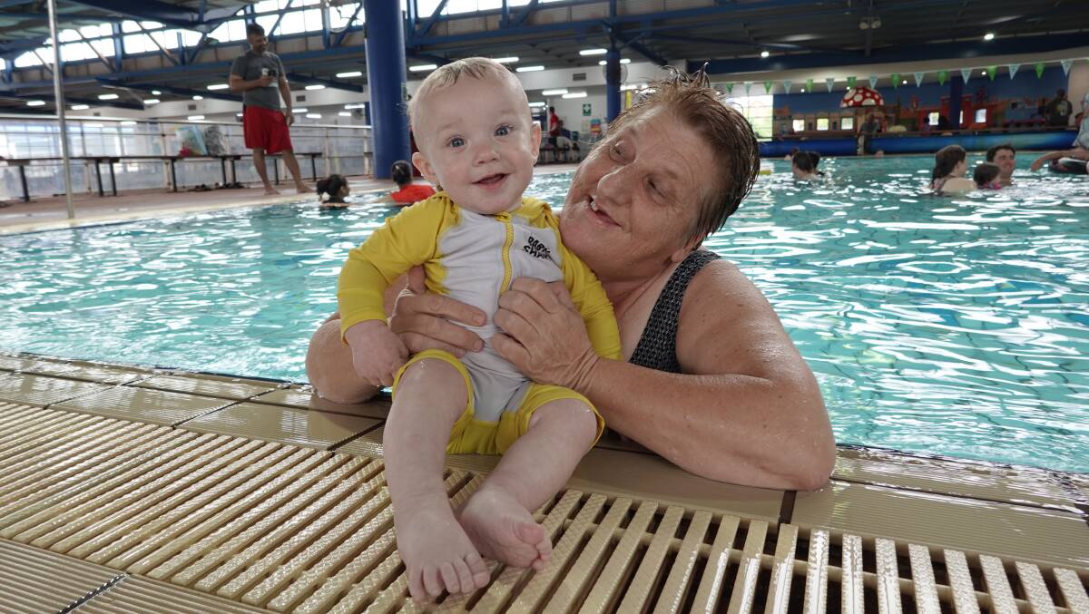 Xavier and Heather Haworth were just two of many Griffith residents who celebrated Australia Day at the pool. Photo: Monty Jacka
