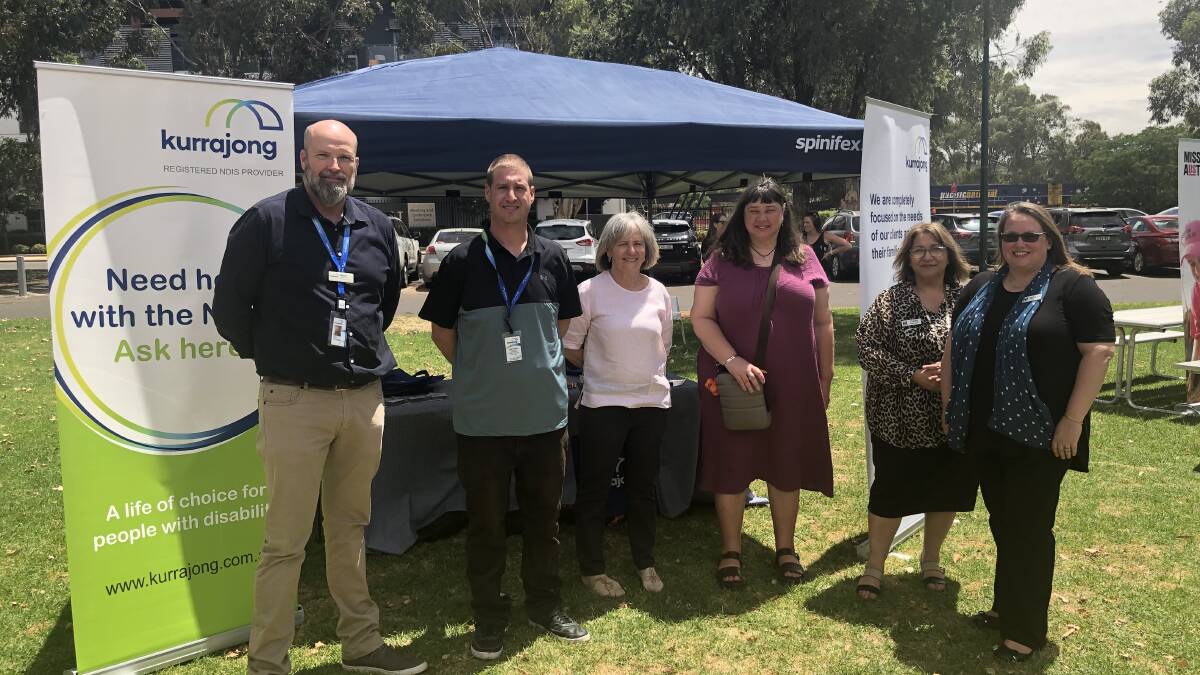 TOGETHER: Kurrajong's Norm Corcoran and Daniel Scott, Griffith Community Centre Coordinator Peta Dummett, Candice Boyd from the University of Melbourne, and Forrest Community Service's Clare Cunial and Belinda Austin.