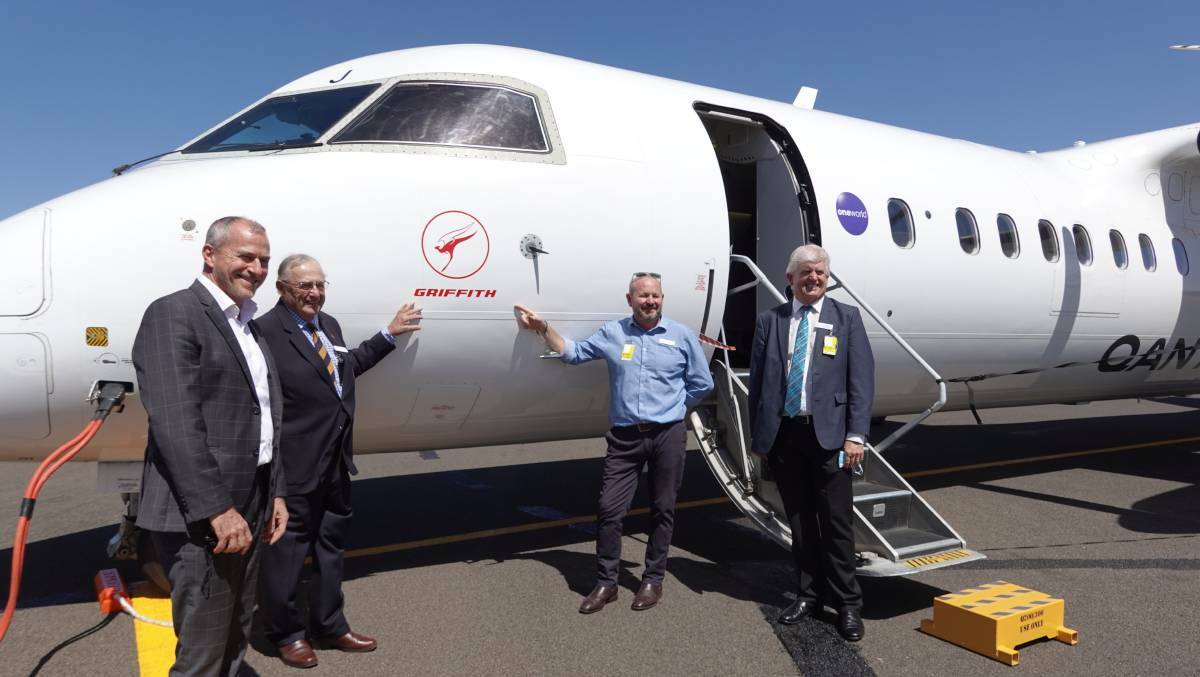 QantasLink CEO John Gissing and Griffith City Council's John Dal Broi, Simon Croce, and Brett Stonestreet with the first Qantas plane of the Griffith-Sydney service in March. PHOTO: Monty Jacka