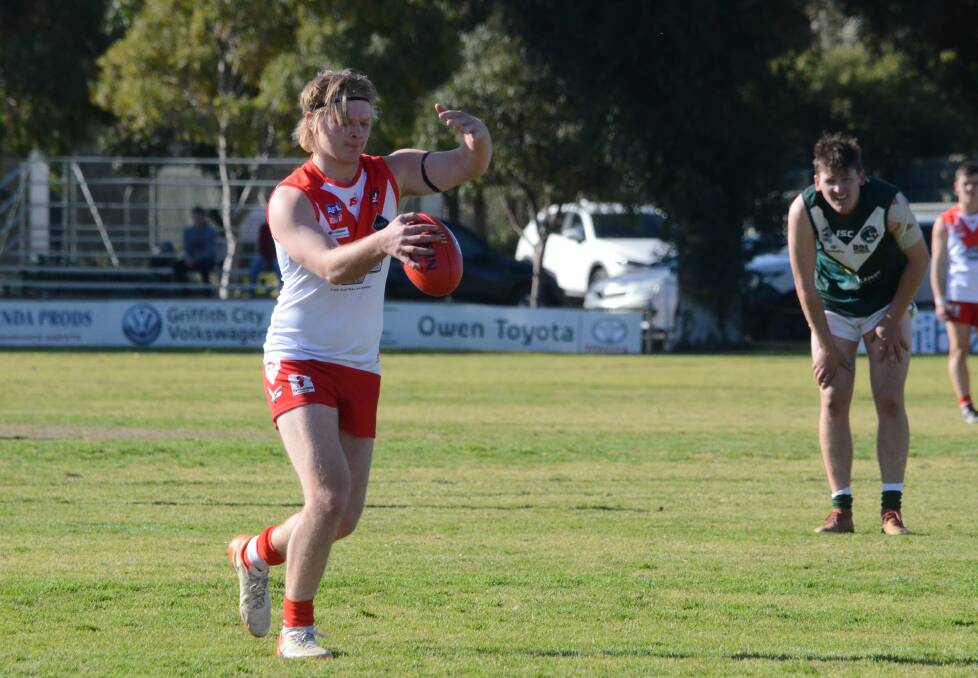 CONSOLATION: Jack Powell kicking a goal in the Swans' defeat to the Coolamon Rovers on Saturday. PHOTO: Monty Jacka