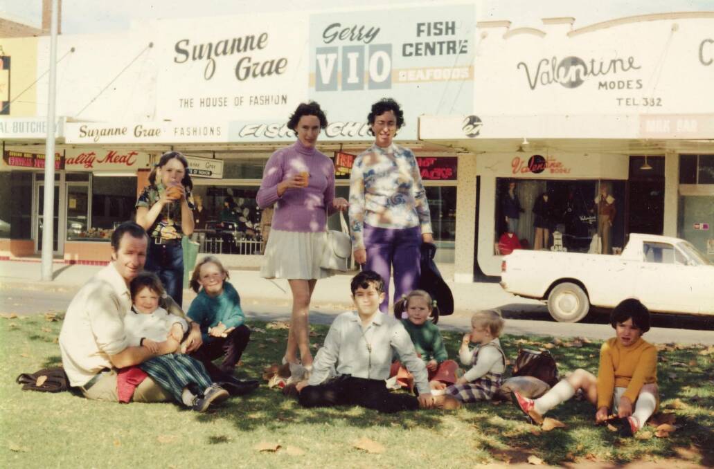 MEMORIES: A group of residents enjoying a day on the lawn opposite Vio's FIsh and Chips in 1972, posted in the online group by John Robinson. PHOTO: Facebook