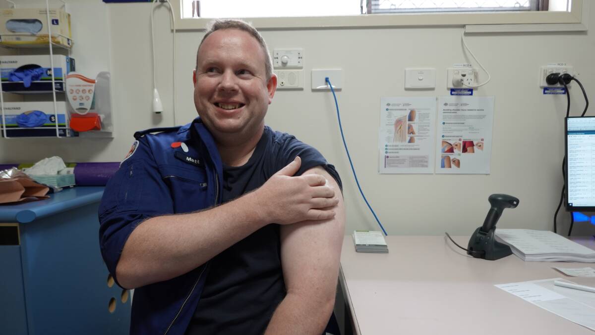 Griffith paramedic Matthew Simpson shortly after receiving the vaccine at Griffith Base Hospital. Photo: Monty Jacka. 
