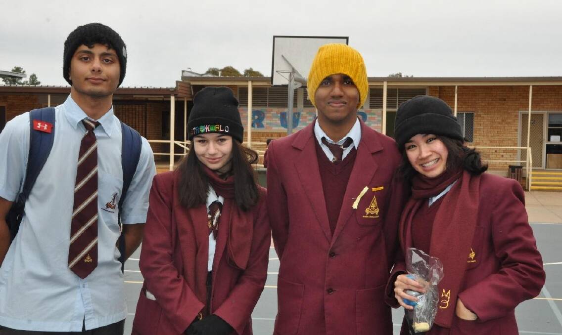 COMMEMORATION: Marian Catholic College students Jashan Toor, Abby Baker, Kavi Thevashangar and Martianne Javier on Beanie Day. PHOTO: Contributed