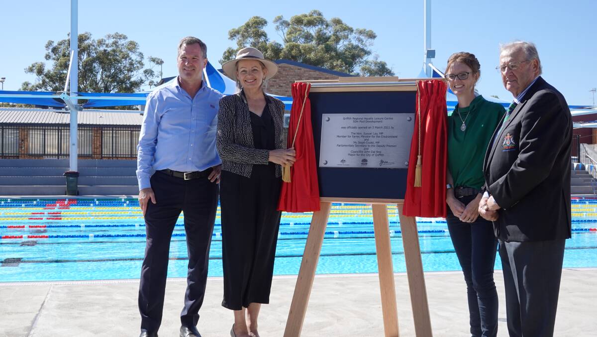 DELIVERED: Hines Constructions' David Hines, Member for Farrer Sussan Ley, Member for Cootamundra Steph Cooke and Griffith Mayor John Dal Broi officially launching Griffith's new outdoor pool. Photo: Monty Jacka