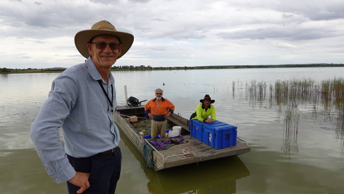 Lake Wyangan Management Committee project officer Tom Mackerras with Keith Bell and Luke Golding. Photo: Monty Jacka