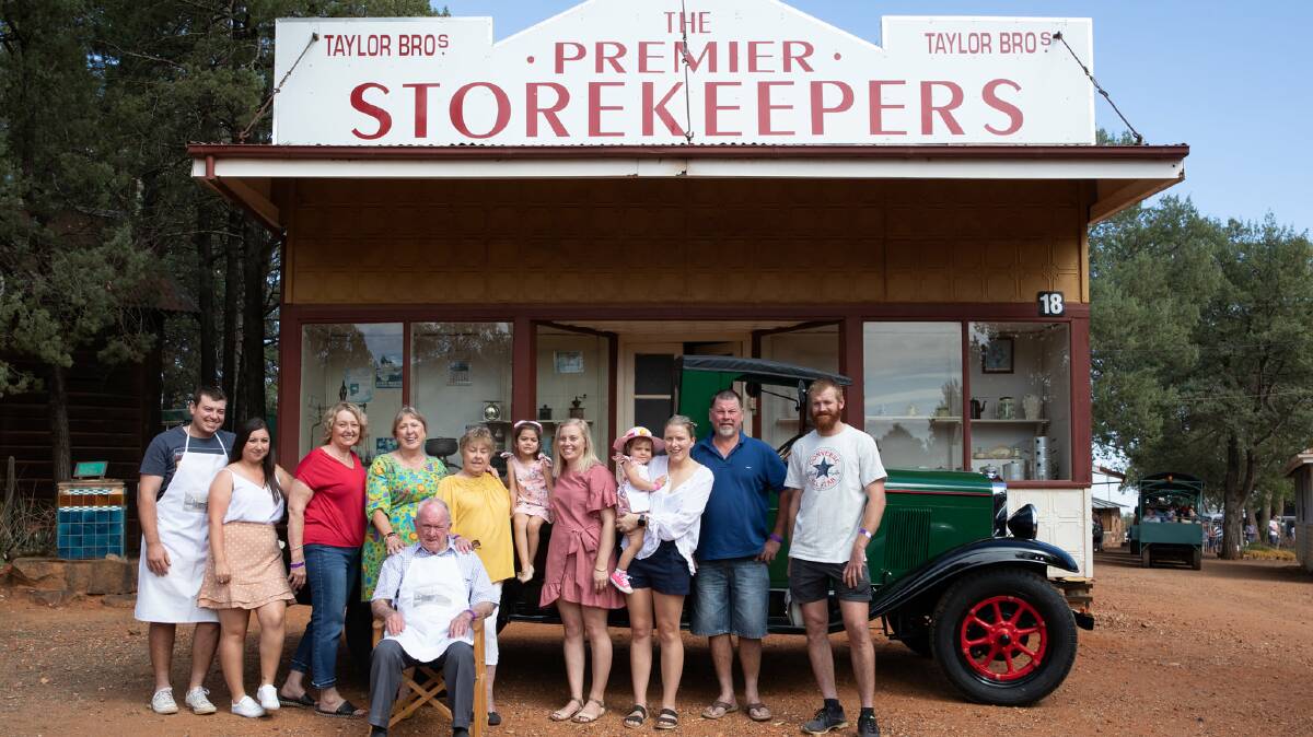 David Alan Taylor (seated) with his family outside the replica of the Taylor Bros grocery at Pioneer Park Museum. Photo: Supplied.
