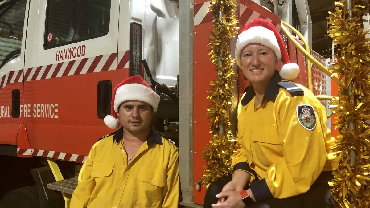 COMING TO TOWN: Hanwood RFS Captain Adam Bertolissi and Deputy Captain Angela Sampson eagerly await the arrival of Santa Claus this weekend. PHOTO: Monty Jacka