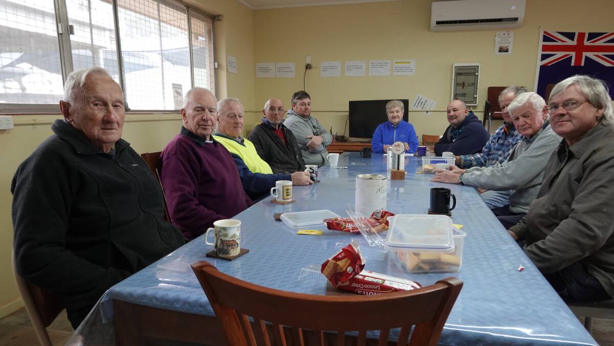 CONVERSATIONS: Geoffrey Gullifer, Athol Sergent, Ray Sully, Angelo Maloni, Ben Murphie, Lyn Sparks, Lindsay Flack, Stan Walters, Reg Brown and Franz Crogh share morning tea at the Griffith Shed for Men. PHOTO: Monty Jacka