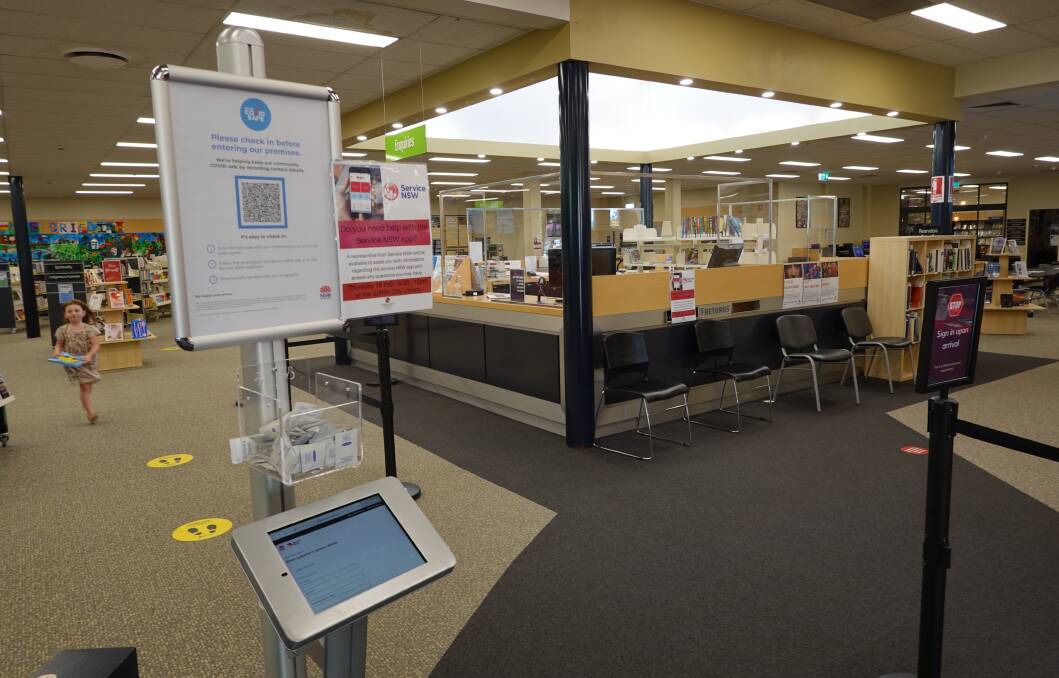 There is a QR code sign-in at the entrance to Griffith City Library. Photo: Monty Jacka